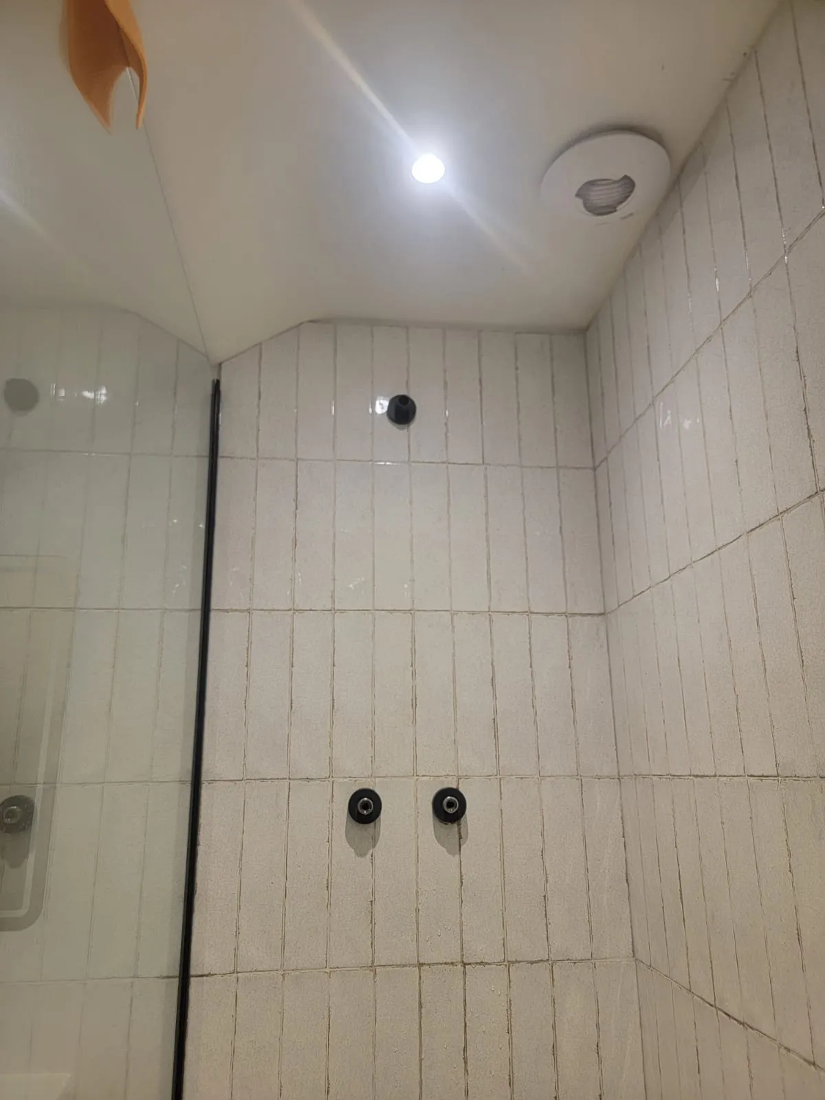 Pre-installation shower wall with rough-in feeds, before thermostatic bar mixer installation in Warrington by Kamdem HomeTech
