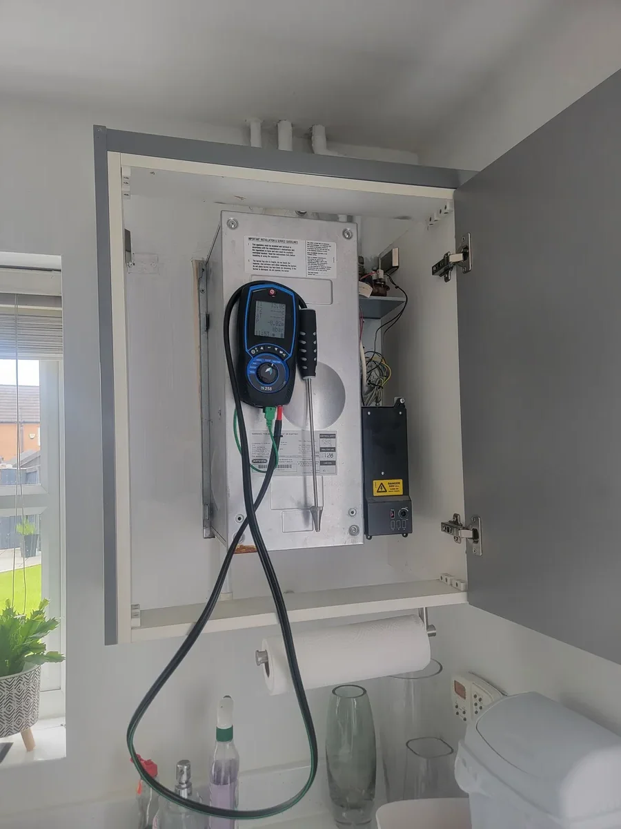 Gas Safe engineer carrying out CP12 landlord safety inspection in Denton, Manchester