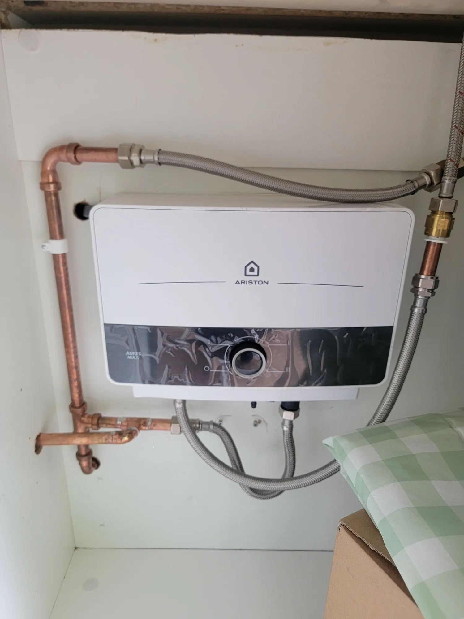 Ariston water heater installation in Tyldesley Manchester by Kamdem HomeTech